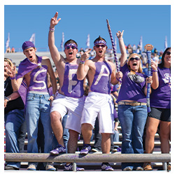 Students cheering in purple haze section