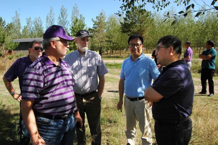 Dr. Jianqiu Zhang, Dr. Yuhui Weng, Dr. Kenneth Farrish, Dr. Hans Williams, and Dr. Brian Oswald 
