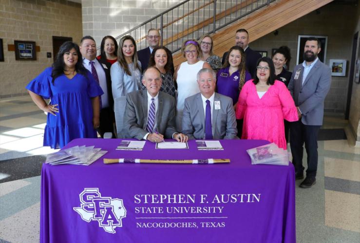  Dr. Steve Westbrook and Hays Consolidated Independent School District Superintendent Dr. Eric Wright with others