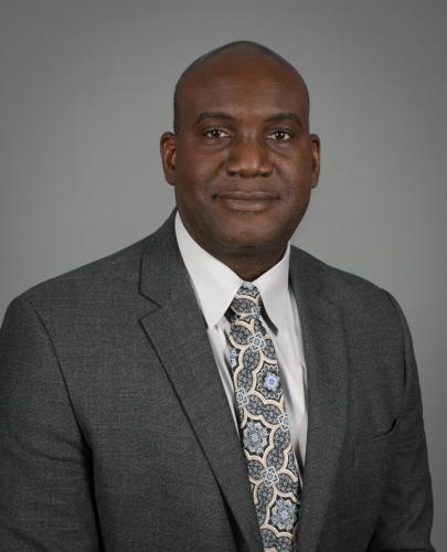 Dr. Archie Holmes