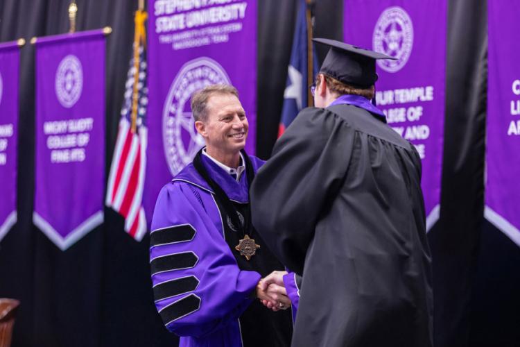 Dr. Neal Weaver, president of Stephen F. Austin State University, at commencement