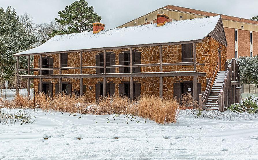 Stone Fort Museum in winter with snow